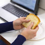 hands analyzing a slice of brioche